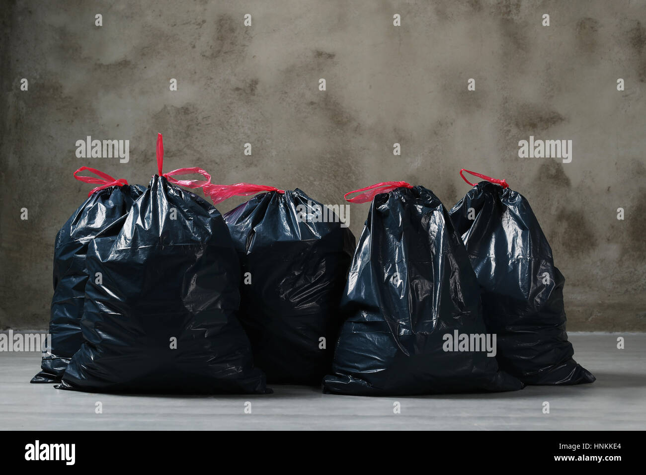 https://c8.alamy.com/comp/HNKKE4/pollution-trash-bags-on-the-floor-HNKKE4.jpg