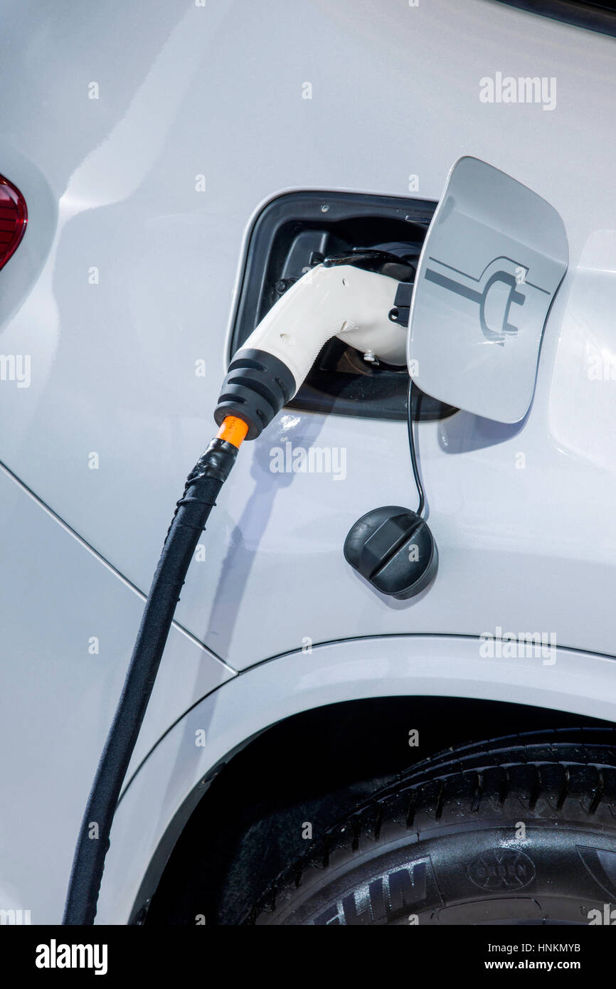 Electric vehicle charging Stock Photo Alamy