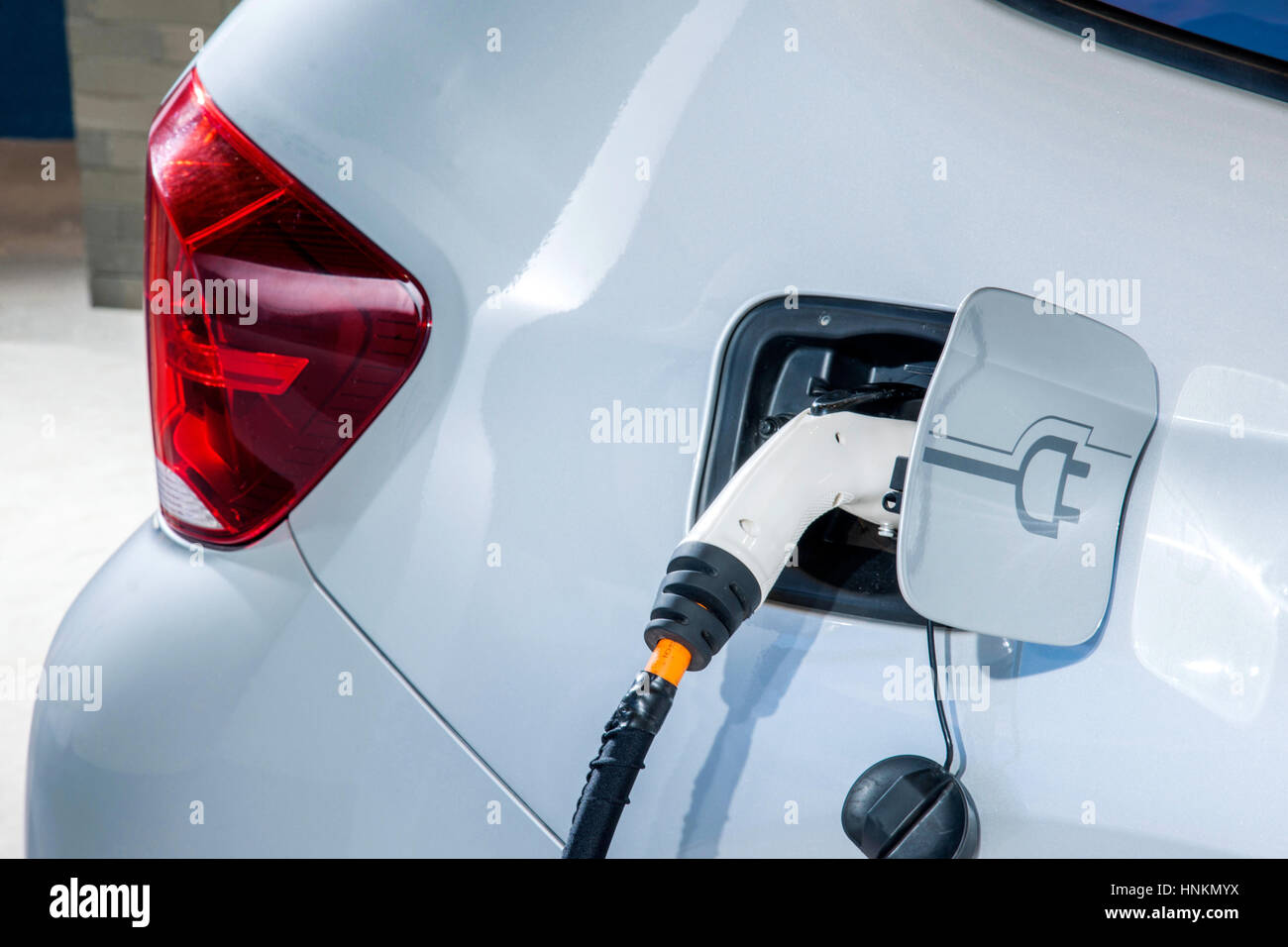 Electric vehicle charging Stock Photo Alamy