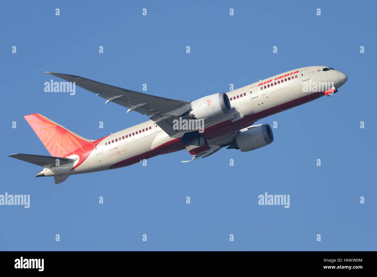 Air India Boeing 787-8 Dreamliner VT-ANI taking off from London Heathrow Airport in blue sky Stock Photo