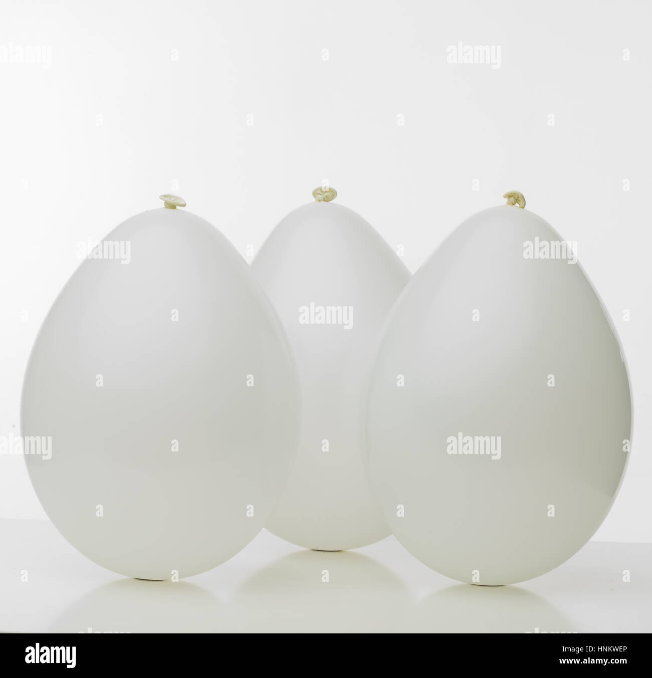 composition with three white balloons with white background Stock Photo ...