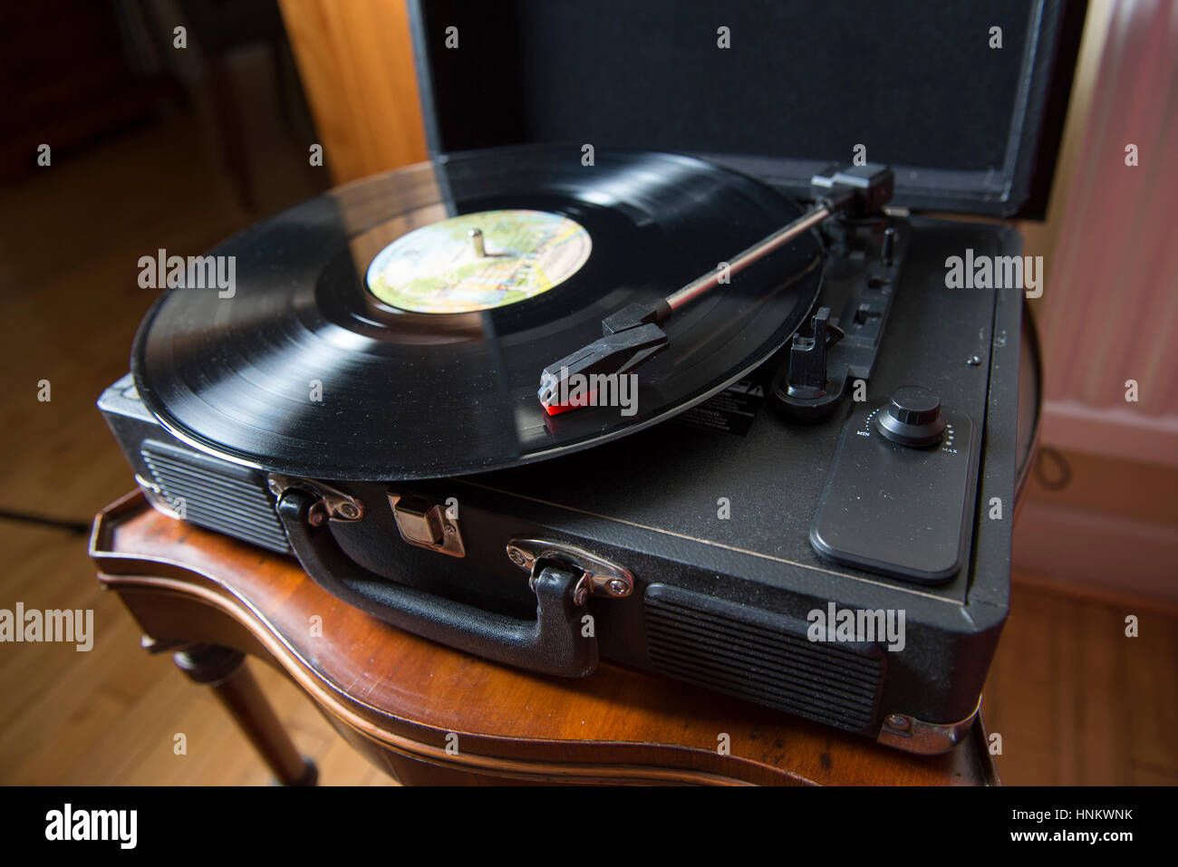 Retro style M&S Portable vinyl record player . Vinyl records have made a huge comeback in last couple of years in the UK Stock Photo