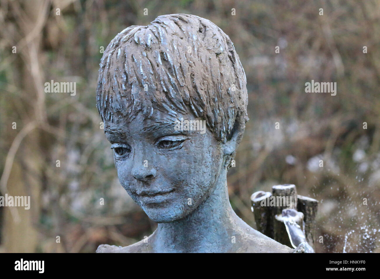 Head of a young girl, part of a water feature at Burton Agnes Hall Stock Photo