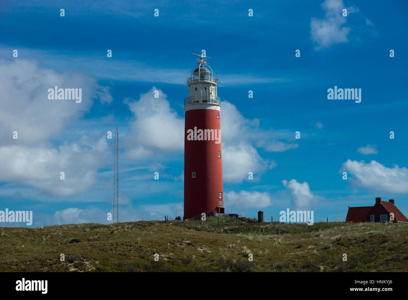 The lighthouse of the island of Texel in The Netherlands on a sunny day Stock Photo