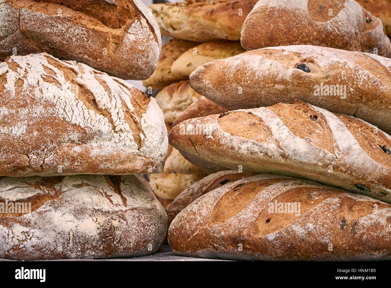 A stack of artisan bread loaves - detail Stock Photo