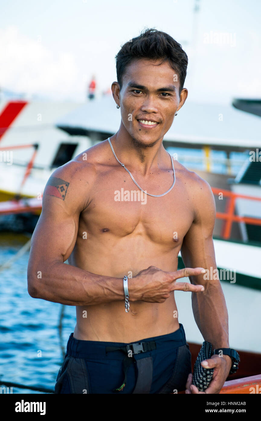 Young man at Santa Ana Wharf, Davao, Davao Del Sur, Philippines Stock Photo