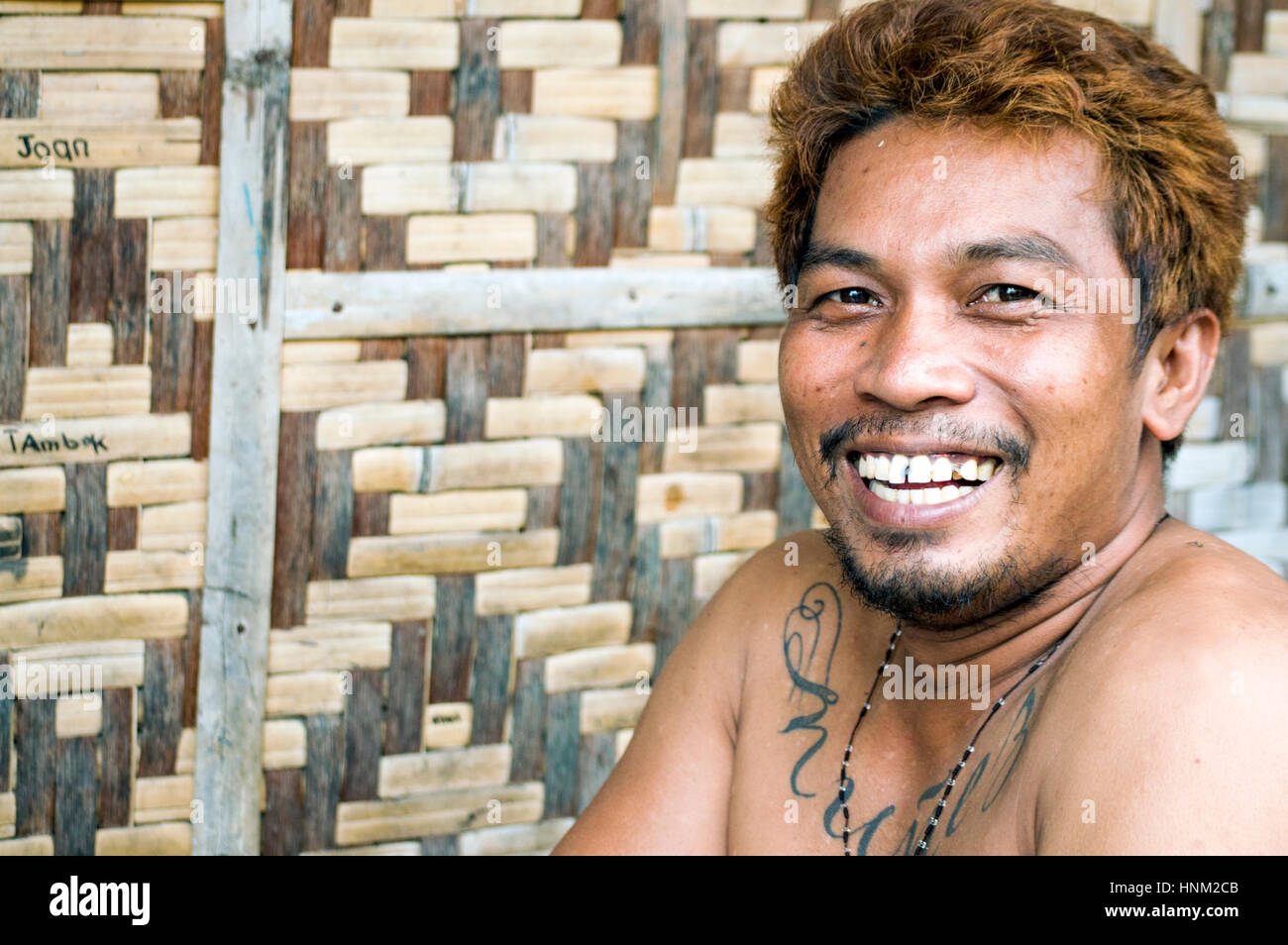 Man in slum by Bangkerohan River, Davao, Davao Del Sur, Philippines Stock Photo