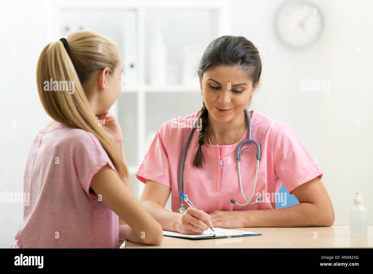 Child Teenager Girl Patient Visiting Doctor's Office Stock Photo