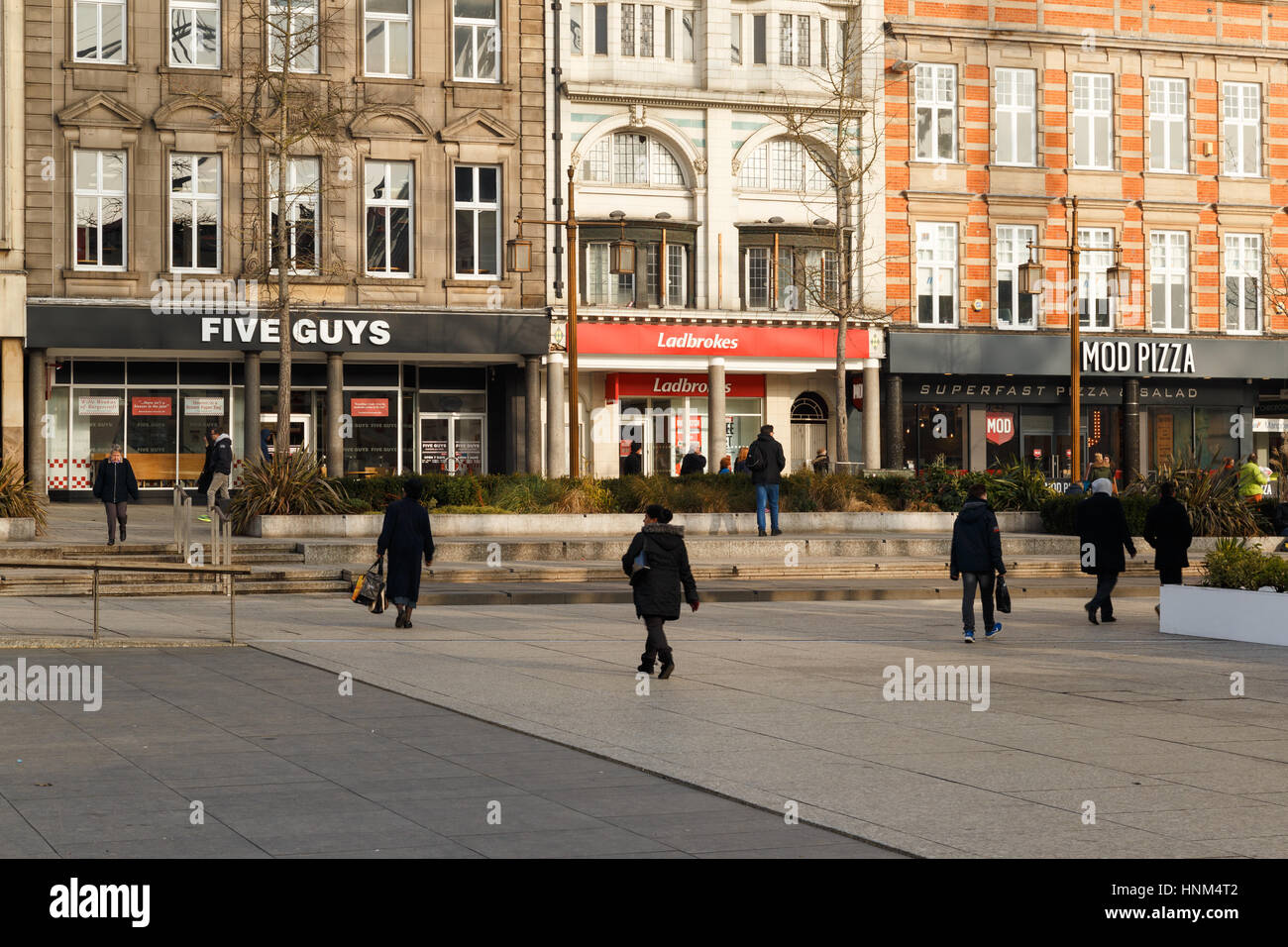 NOTTINGHAM, ENGLAND - FEBRUARY 13: Five Guys burger, and MOD pizza restaurant in close proximity, Nottingham. In Nottingham, England. On 13th February Stock Photo