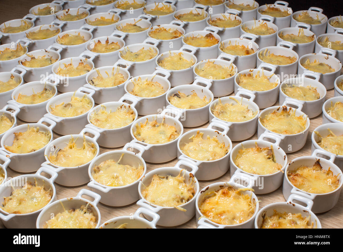 Buffet julienne fondue melted cheese Stock Photo