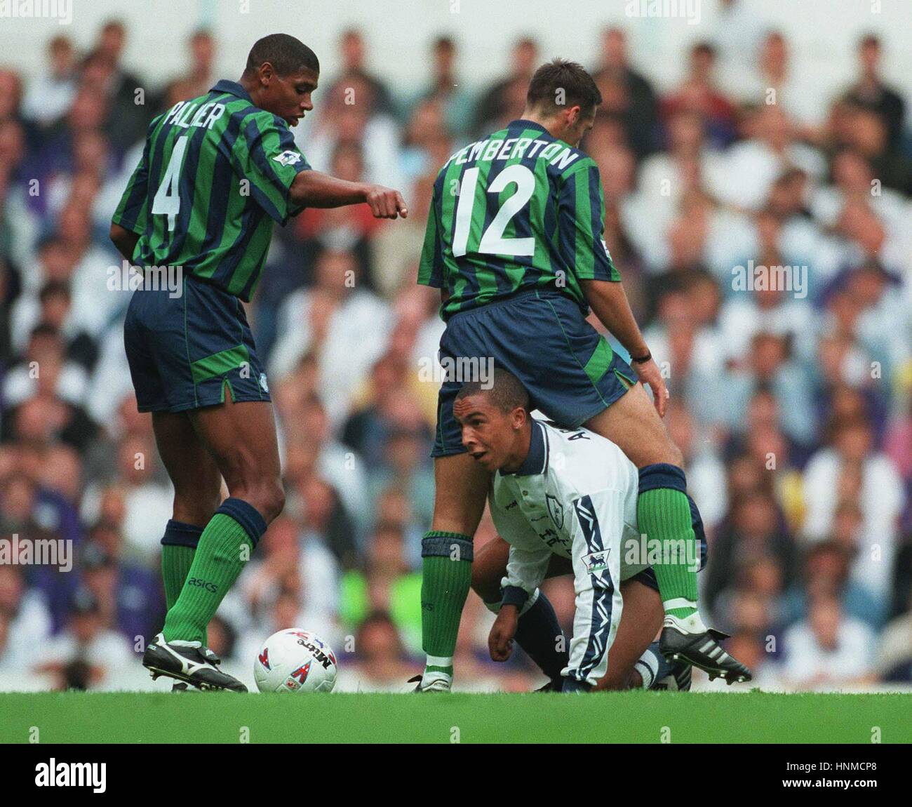 PALMER TRYS TO TELL THE REF ARMSTRONG GOT THE GAME WRONG 09 September 1995 Stock Photo