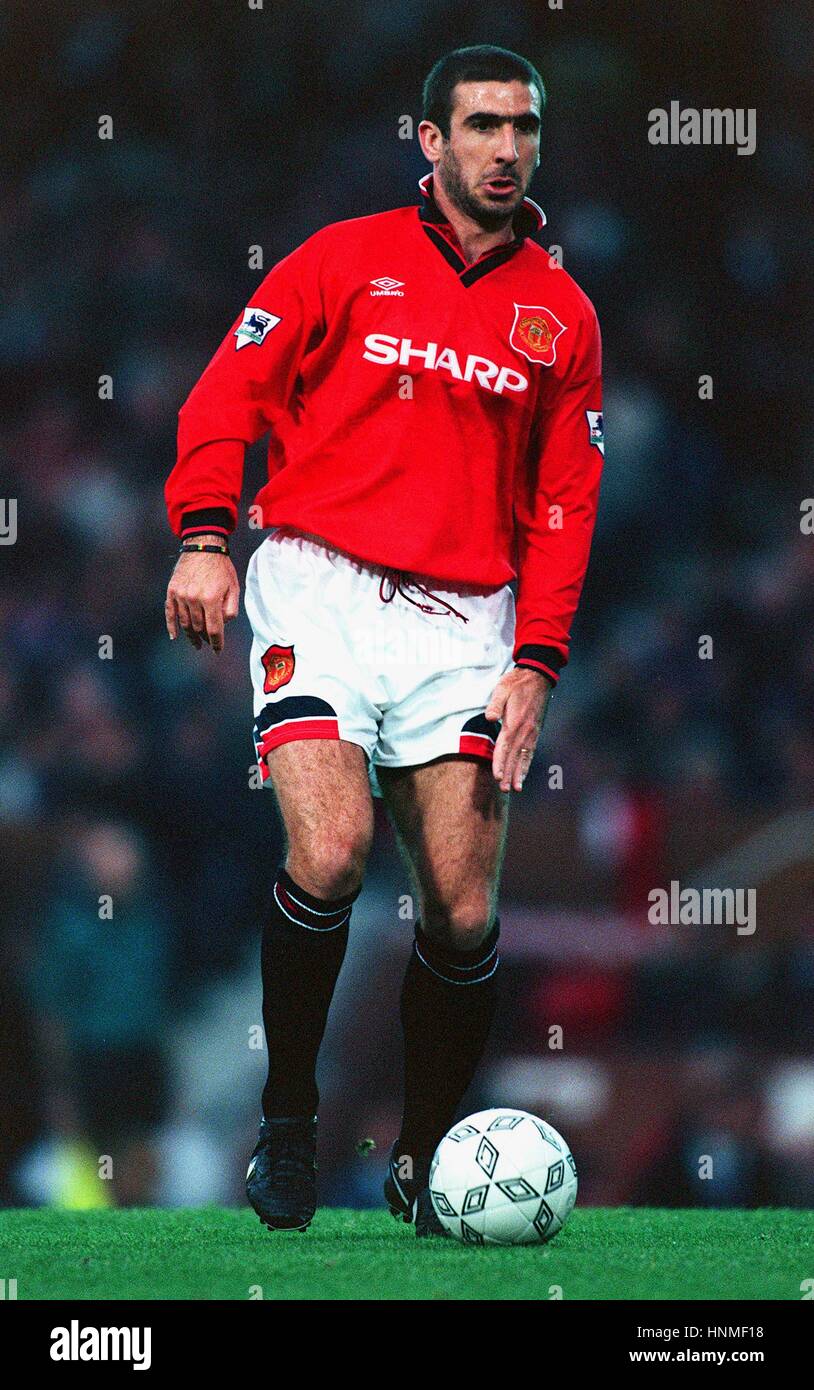 ERIC CANTONA, MANCHESTER UNITED, IS HELD BACK AFTER ATTACKING A CRYSTAL