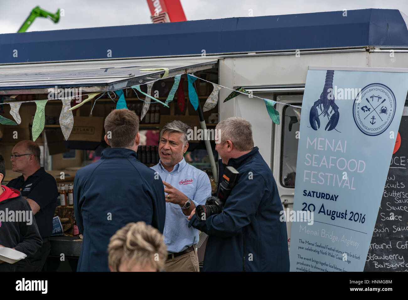 David Evans of Dylan's speaks to press at their Seafood stall at the Anglesey Show Stock Photo