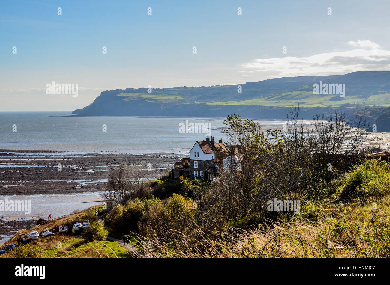 House on a cliff by the sea in Robin Hood's Bay, North Yorkshire Stock