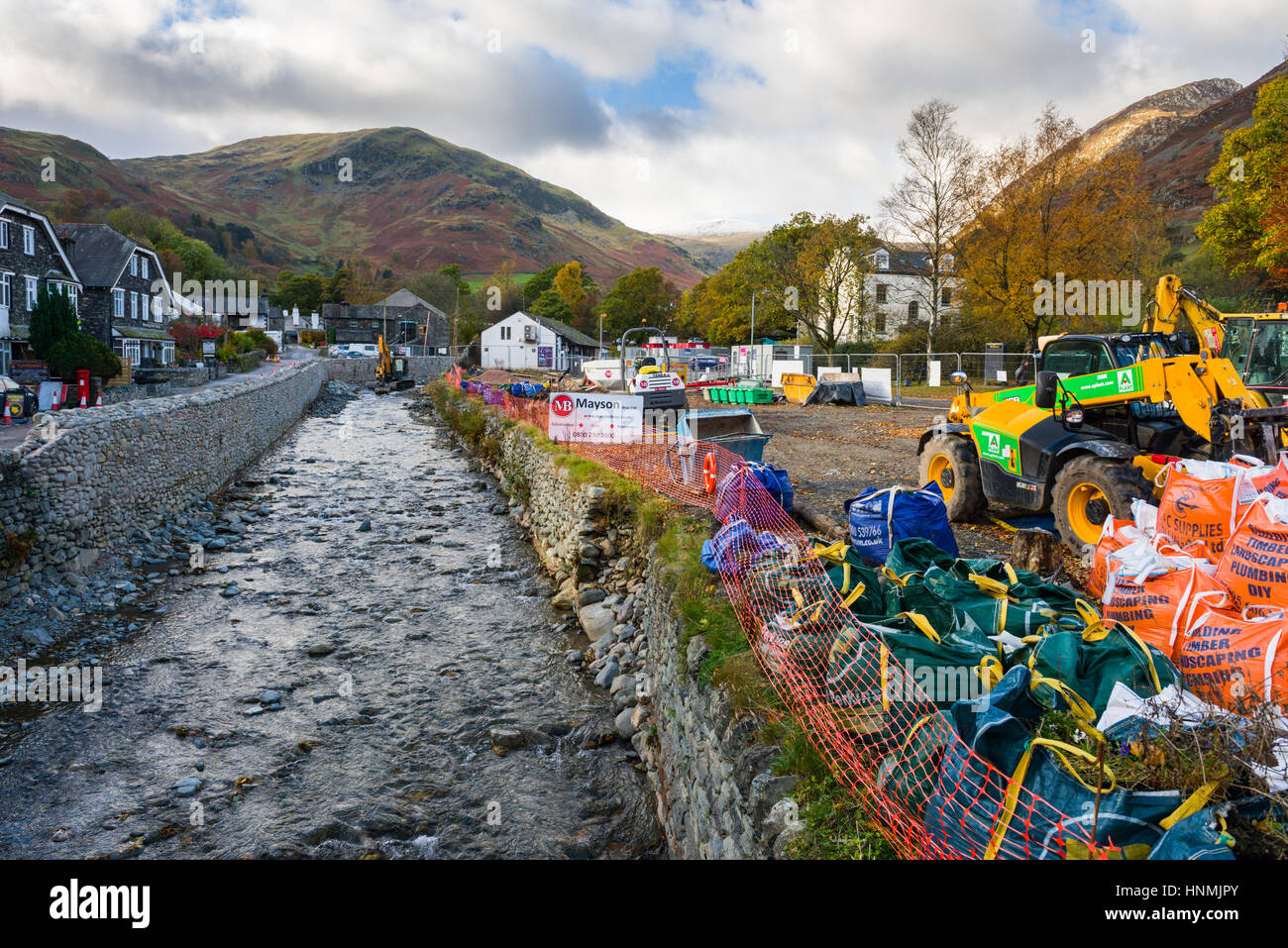 Repairs being made to flood damage at Glenridding after the 2015 storm Desmond. Lake District National Park, Cumbria, England. Stock Photo