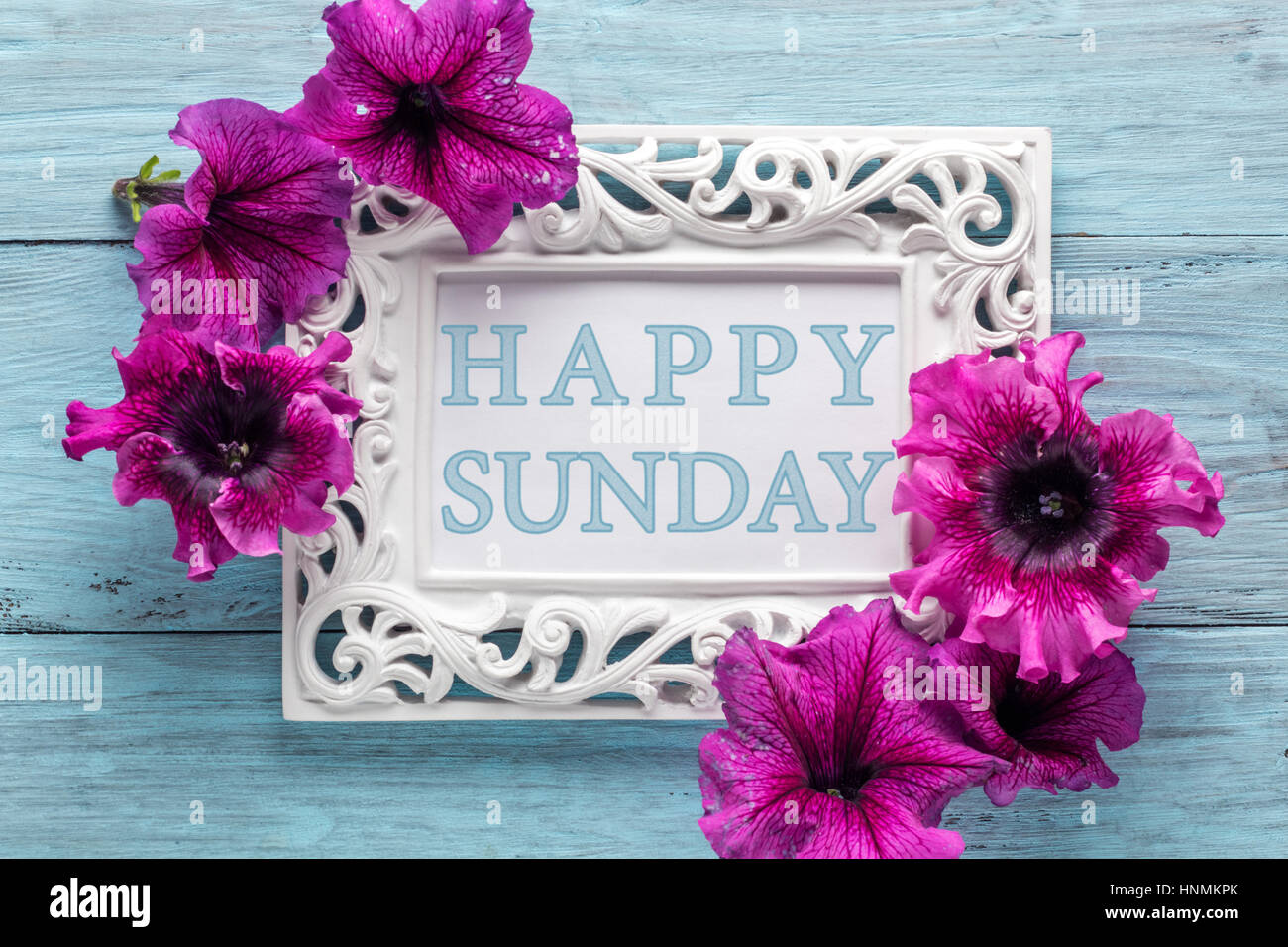 Frame with flowers and text: Happy sunday Stock Photo - Alamy