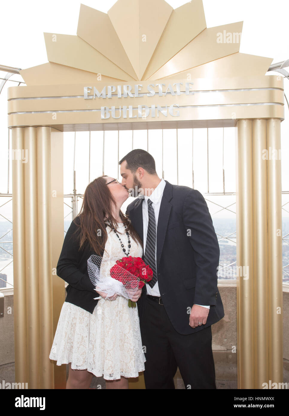 New York,, USA. 14th Feb, 2017. Danielle Stone and Brian Doyle are married  as part of the Empire State Building's 23rd Annual Valentine's Day Weddings  contest, February 14, 2017. Credit: Bryan Smith/ZUMA, image size:966x1390