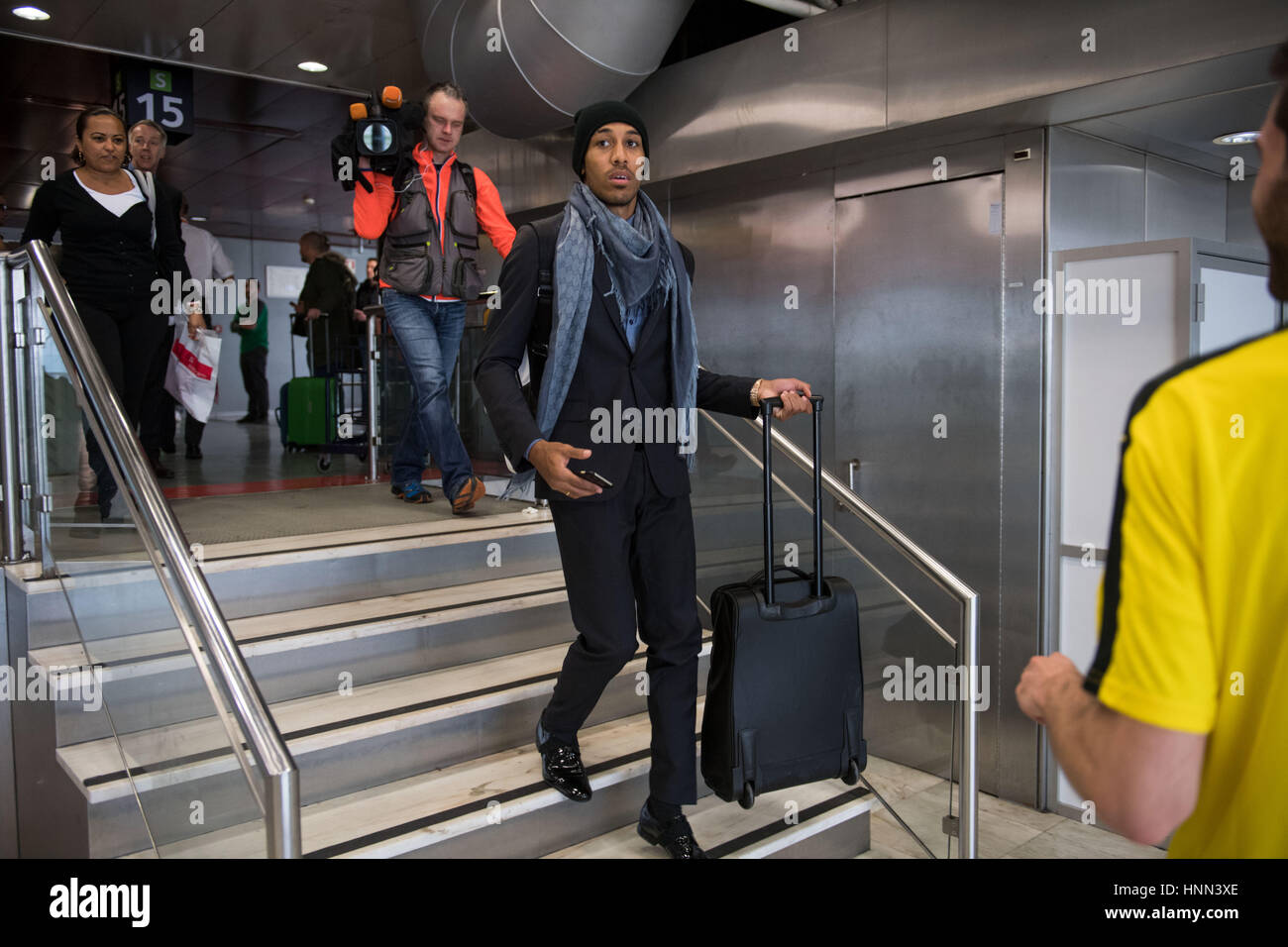 Lisbon, Portugal. 15th Feb, 2017. Borussia Dortmund player Pierre-Emerick Aubameyang waits for the return flight at the airport in Lisbon, Portugal, 15 February 2017. BVB were defeated in the round of 16 soccer Champions Legaue match by S.L. Benfica. Photo: Bernd Thissen/dpa/Alamy Live News Stock Photo