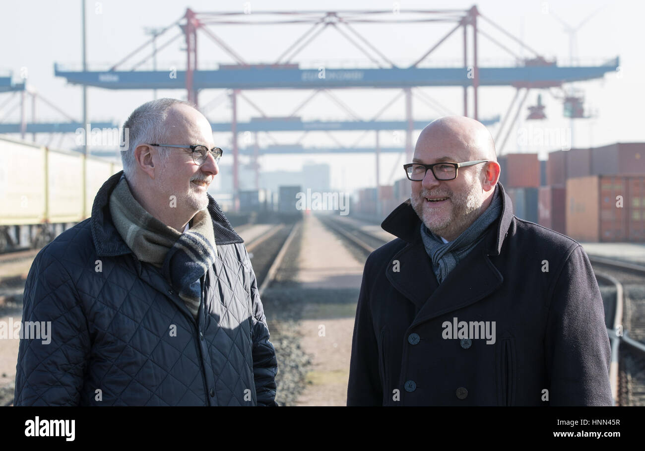 Hamburg, Germany. 15th Feb, 2017. Ingo Egloff (L) and Axel Mattern, Chiefs of Port of Hamburg Marketing, stand at the site of the Eurokombi logistics company during a press conference in the Port of Hamburg, Germany, 15 February 2017. The Port of Hamburg had a slight increase in turnover thanks to a strong final spurt last year. Photo: Christian Charisius/dpa/Alamy Live News Stock Photo