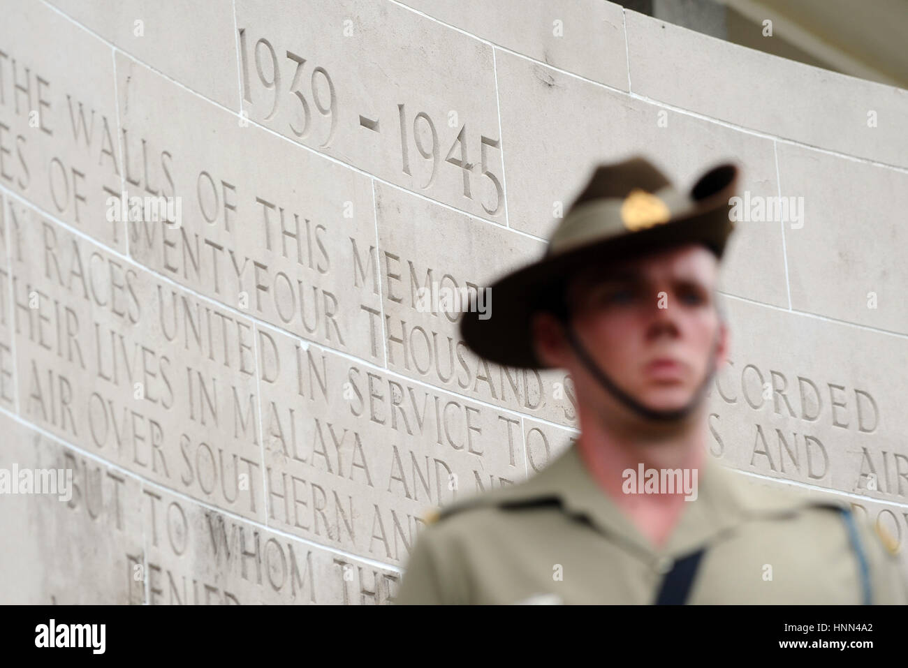 Singapore. 15th Feb, 2017. An Australian soldier stands guard at Singapore's Kranji War Cemetery, Feb. 15, 2017. Singapore Chinese Chamber of Commerce and Industry (SCCCI) on Wednesday held the 50th war memorial service to commemorate civilian victims of the Japanese occupation. Credit: Then Chih Wey/Xinhua/Alamy Live News Stock Photo
