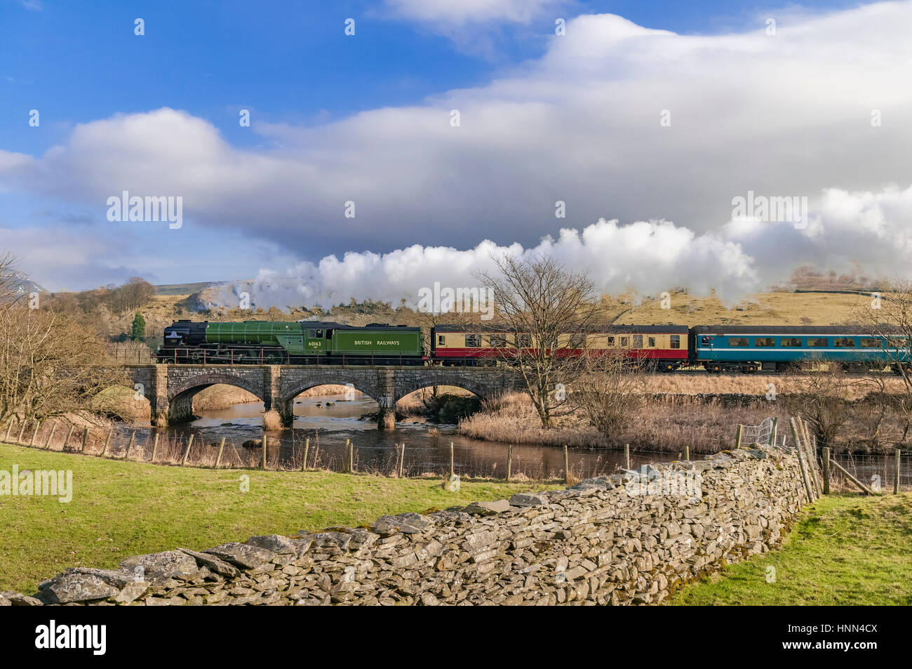 Helwith Bridge. North Yorkshire. North West England. Wednesday 15th February 2017. The Peppercorn steam engine Tornado on the secnond day of hauling scheduled trains between Skipton and Appleby on the Settle to Carlisle railway. The services are the first schedueld steam hauled services on British rail for 50 years. The train is pictured passing over Helwith Bridge 4 miles north of Settle. Credit: John Davidson/Alamy Live News. Stock Photo