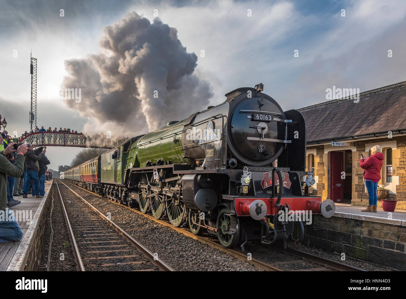 Settle. North Yorkshire. North West England. Wednesday 15th February 2017. The Peppercorn steam engine Tornado on the secnond day of hauling scheduled trains between Skipton and Appleby on the Settle to Carlisle railway. The services are the first schedueld steam hauled services on British rail for 50 years. The tarin is pictured at Settle station with many onlookers with their cameras at the ready. Credit: John Davidson/Alamy Live News. Stock Photo