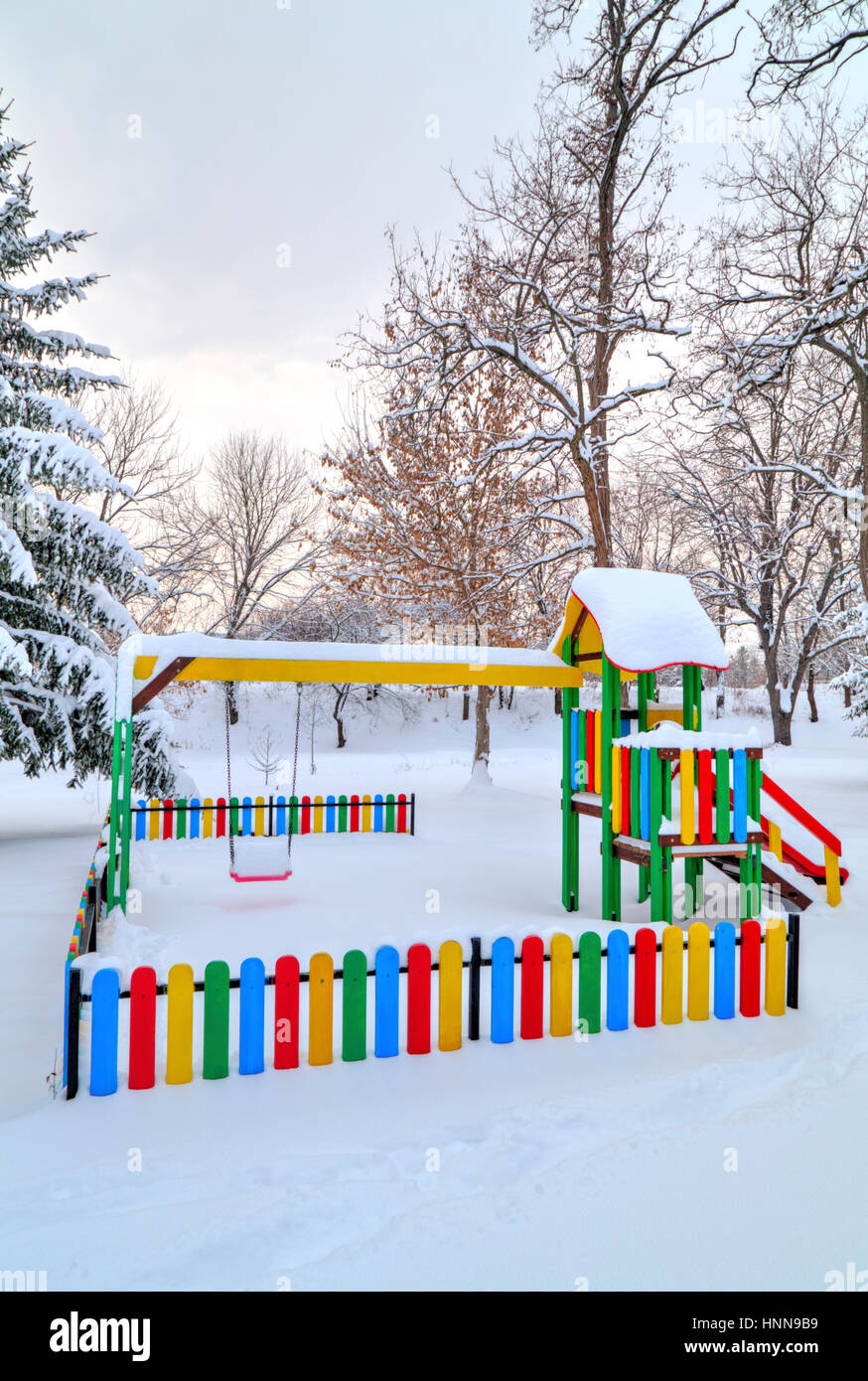 Children's playground covered with snow in winter Stock Photo - Alamy