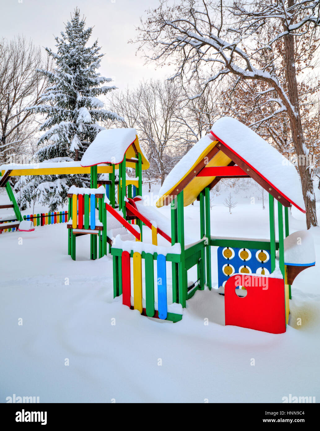 Children's playground covered with snow in winter Stock Photo - Alamy
