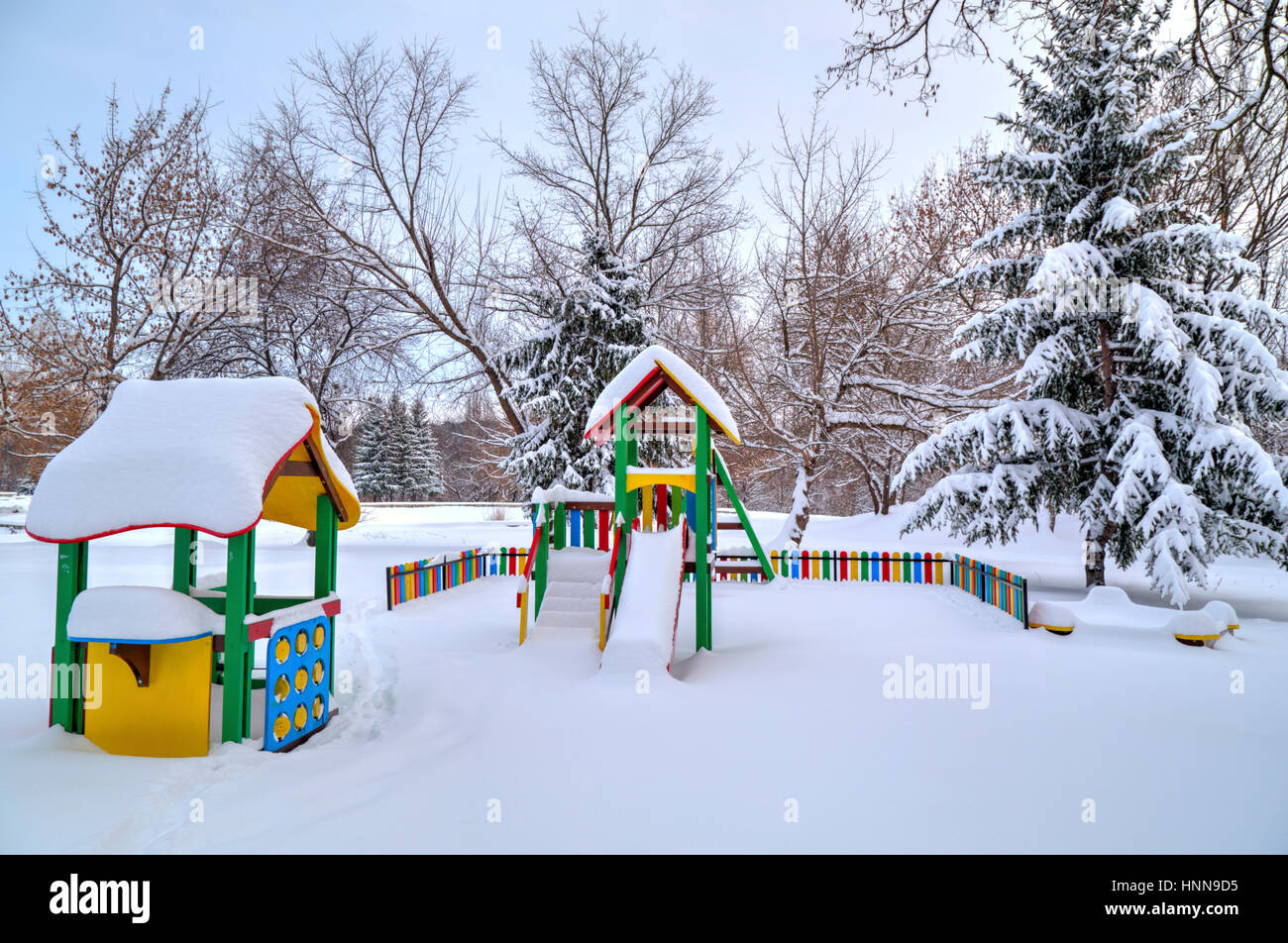 Children's playground covered with snow in winter Stock Photo - Alamy
