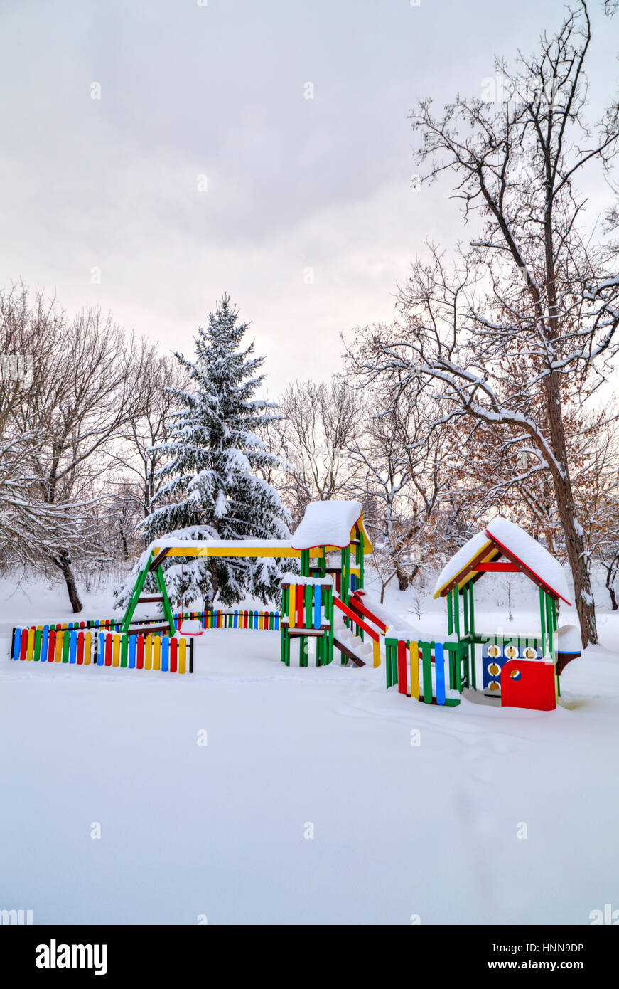 Children's playground covered with snow in winter Stock Photo - Alamy