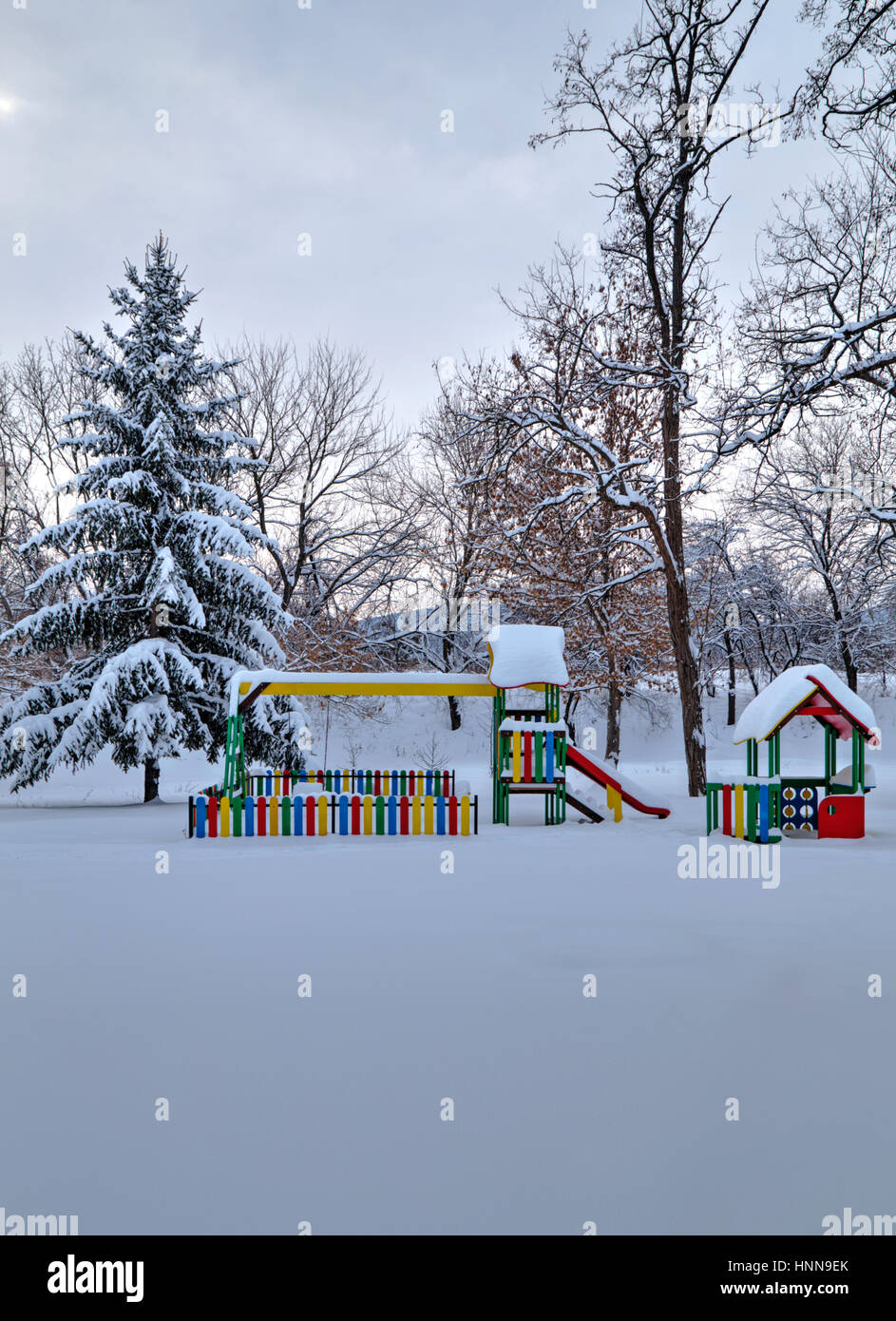 Children's playground covered with snow in winter Stock Photo - Alamy