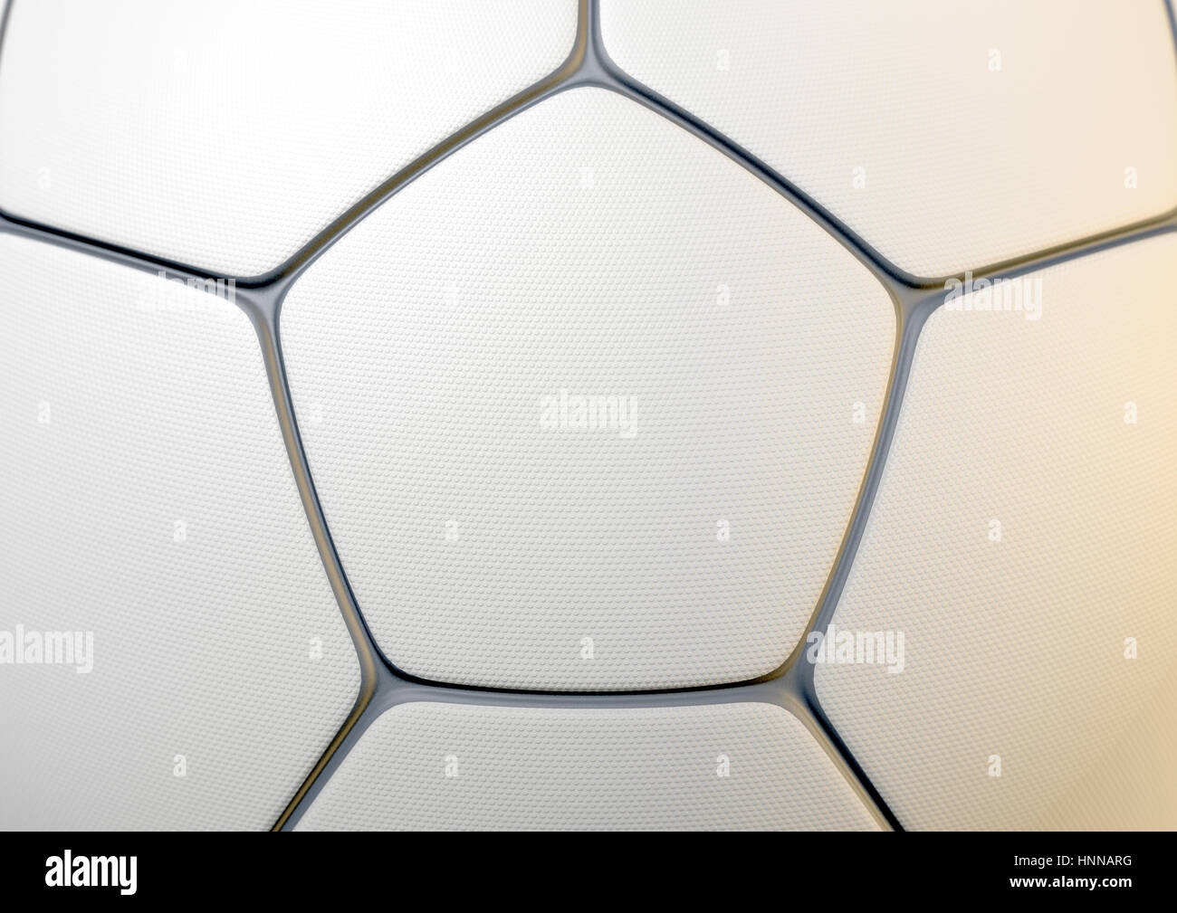 A closeup concept of a white synthetic soccer ball in a traditional shape with a dimple textured surface and dark grey inlays - 3D render Stock Photo