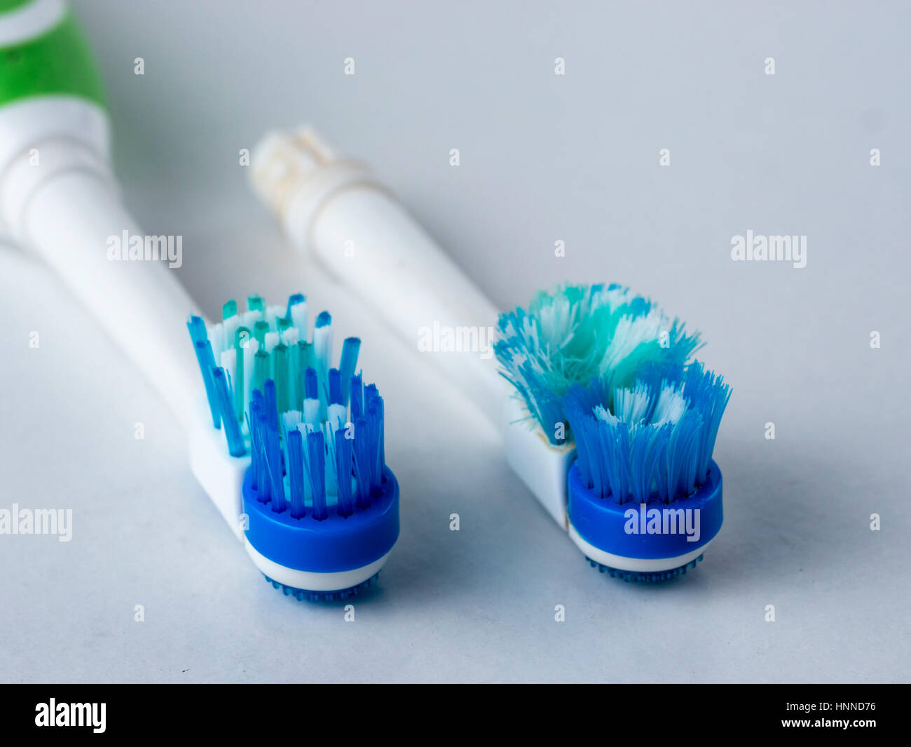 New and old nozzle electric toothbrushes Stock Photo - Alamy