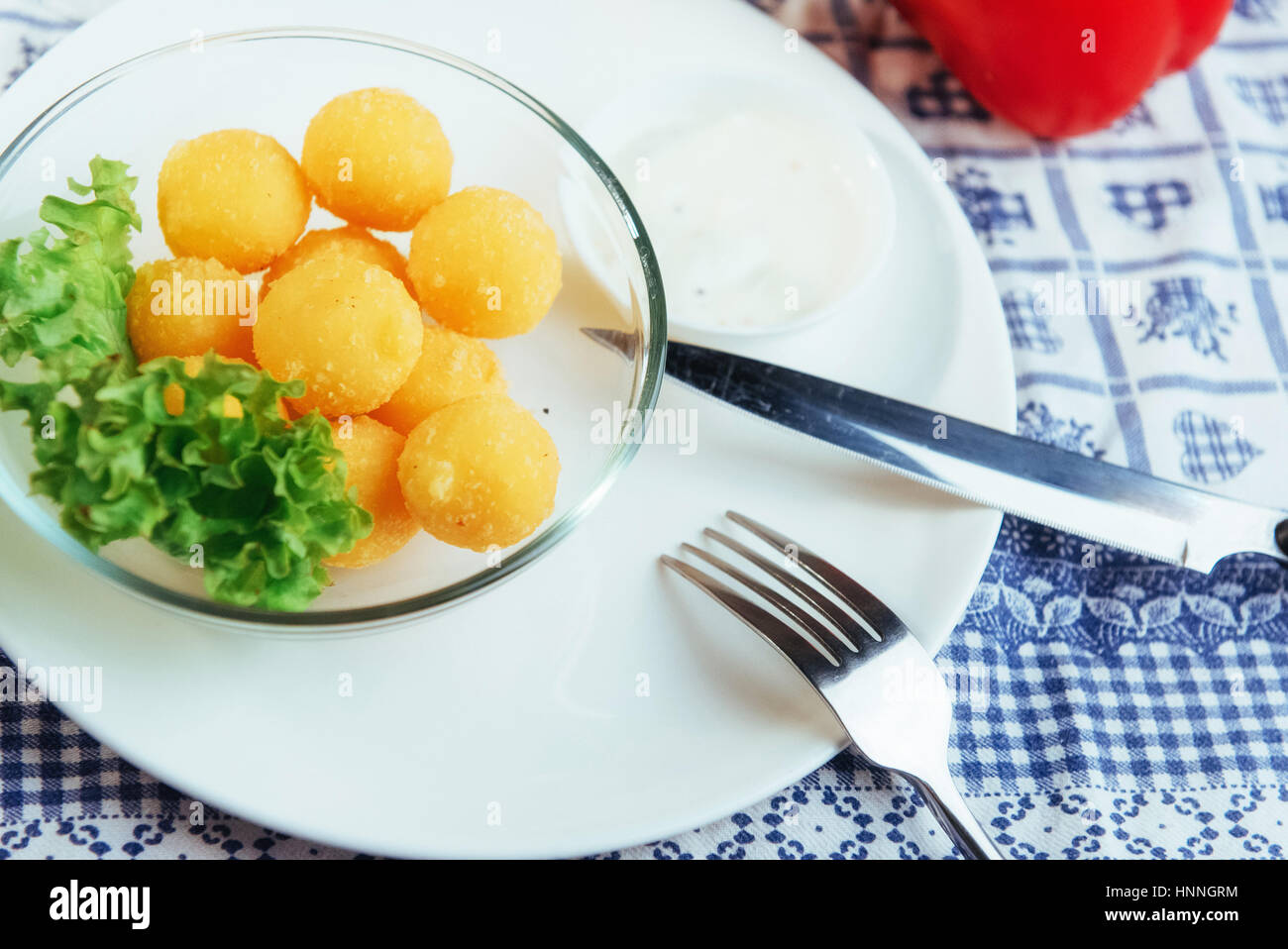 Deep fried cheese balls with lettuce and sauce Stock Photo Alamy