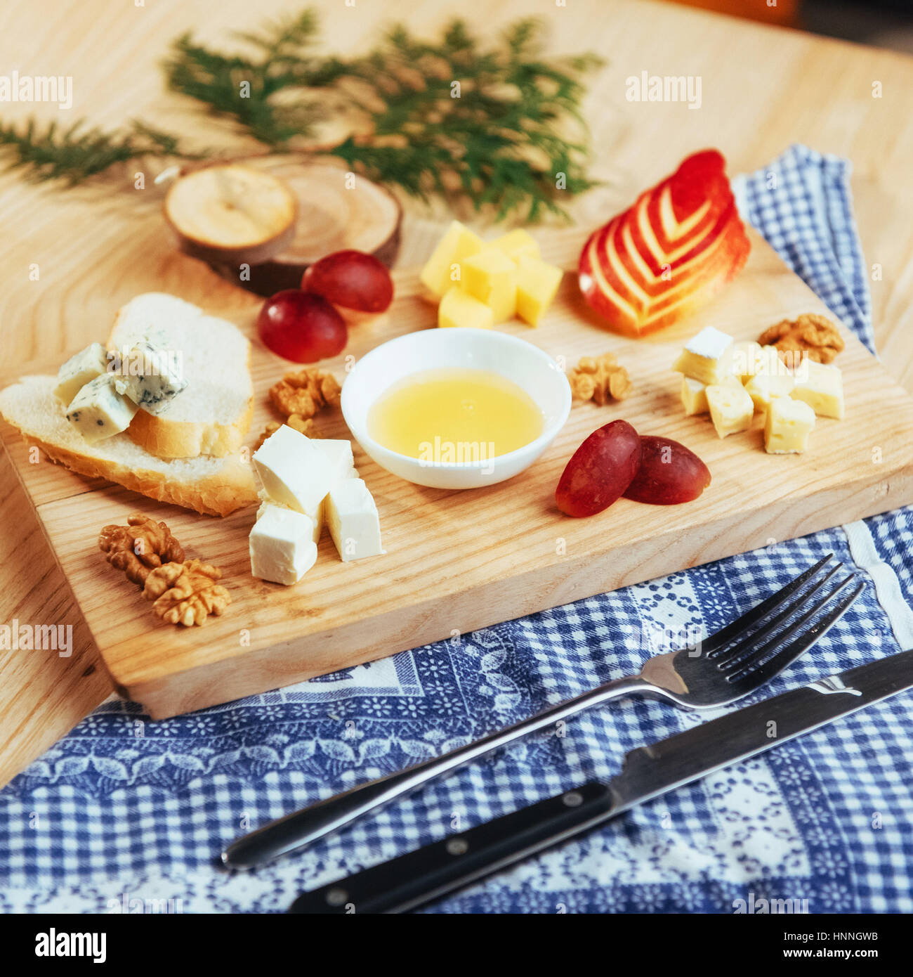 plate with blue cheese Dor, parmesan, Brie Stock Photo
