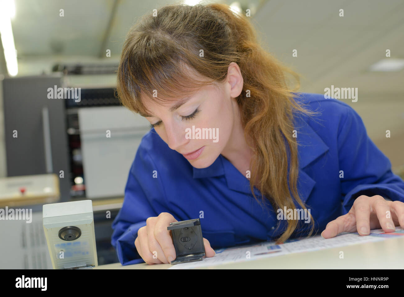 Newspaper worker printing press hires stock photography and images Alamy