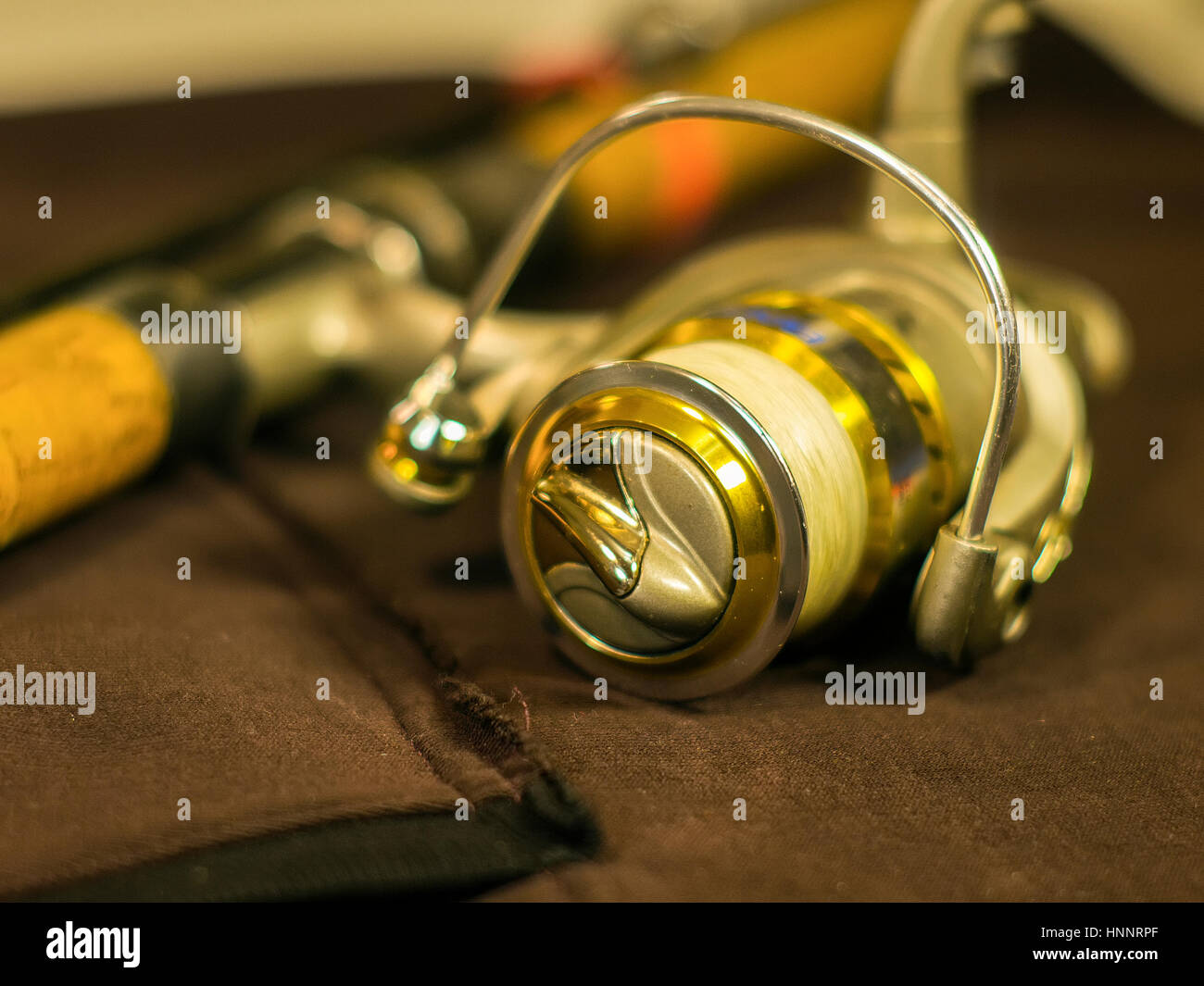The fishing reels on the fishing rod close-up Stock Photo