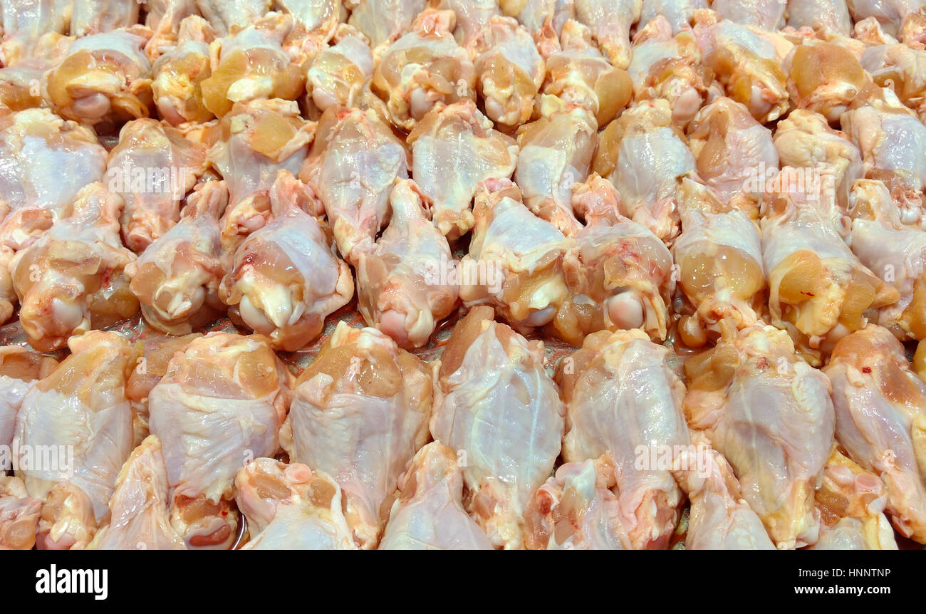Raw of chicken wingstick at fresh food department in supermarket. Stock Photo