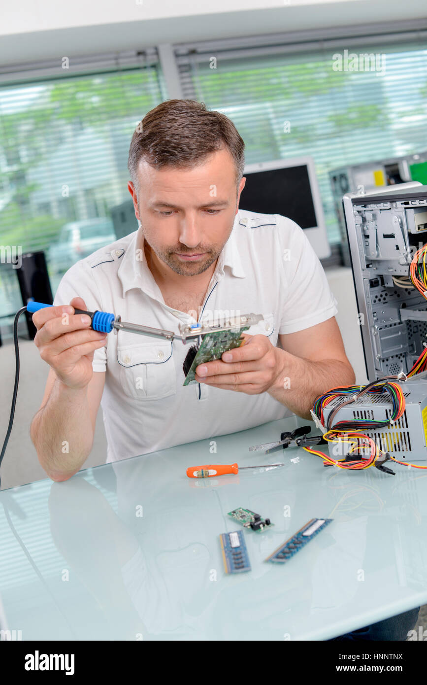 Soldering a video card Stock Photo Alamy