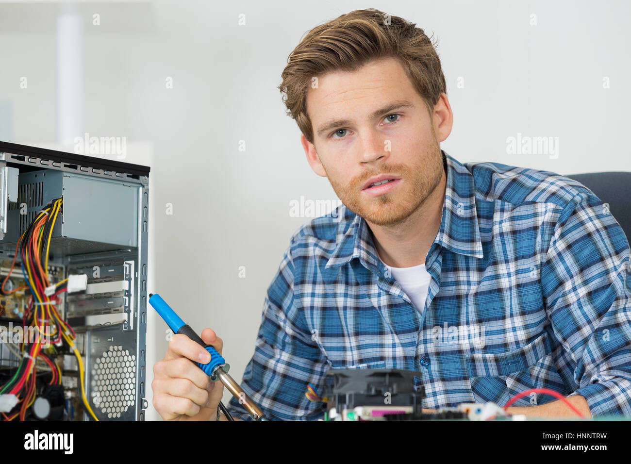 soldering the computer parts Stock Photo Alamy