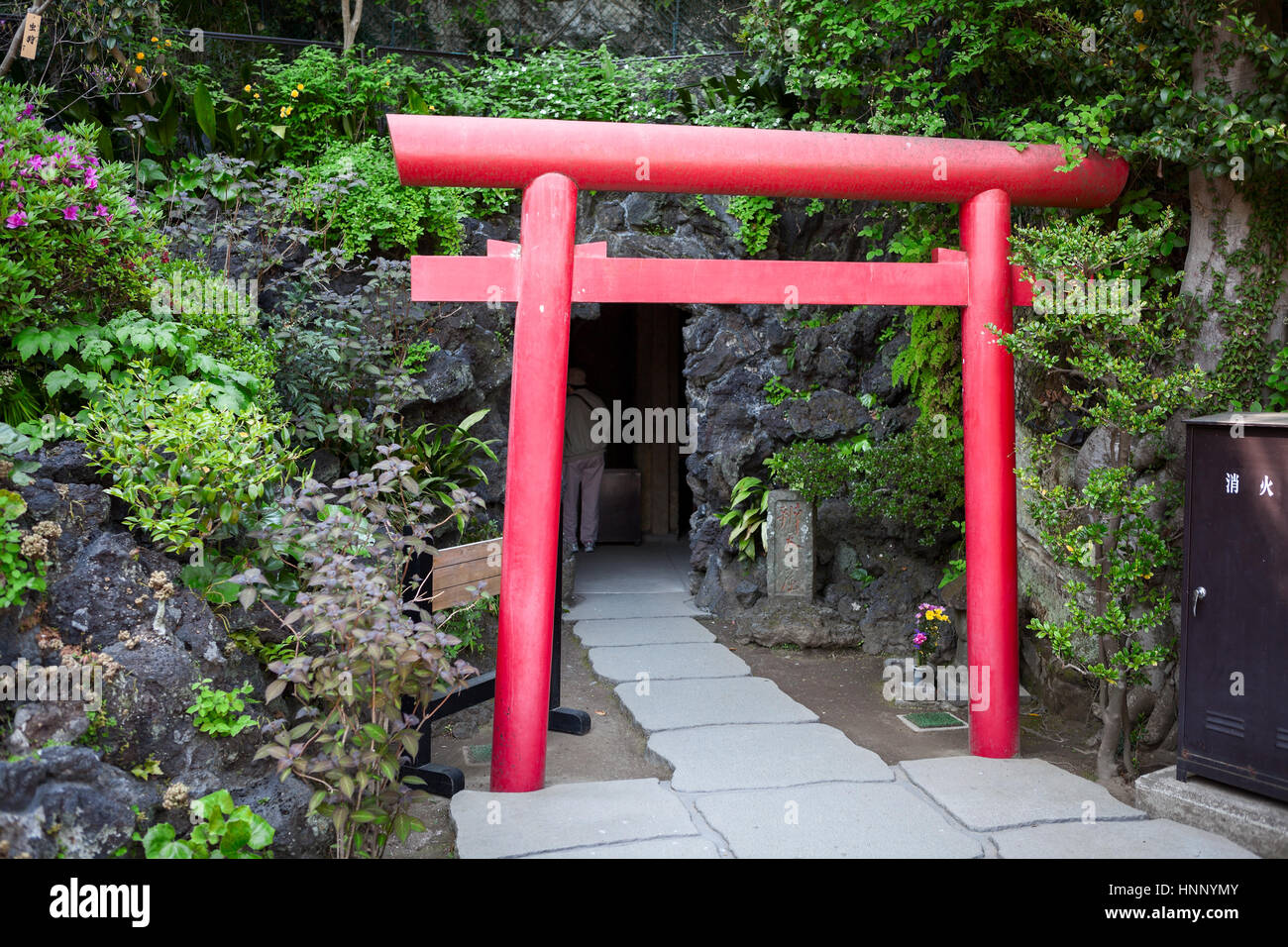 KAMAKURA, JAPAN - CIRCA APR, 2013: Red gate (torii) is on the entrance in the Benten-do Hall and Benten-kutsu Caves. The Hasedera shrine (Hase-dera) i Stock Photo