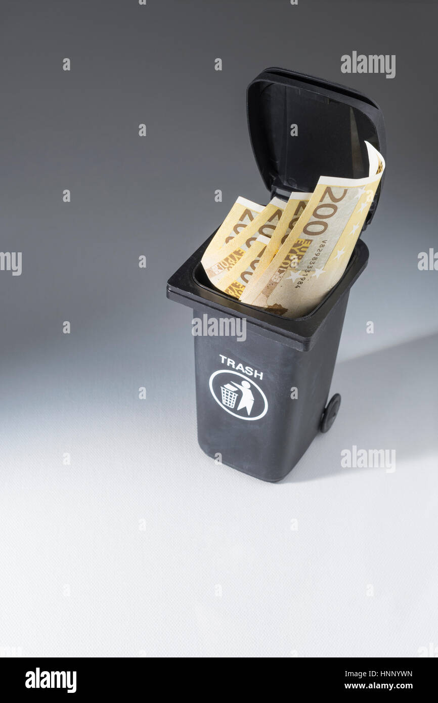 200 Euro banknotes / bills in a toy wheely bin / wheelie bin / trash