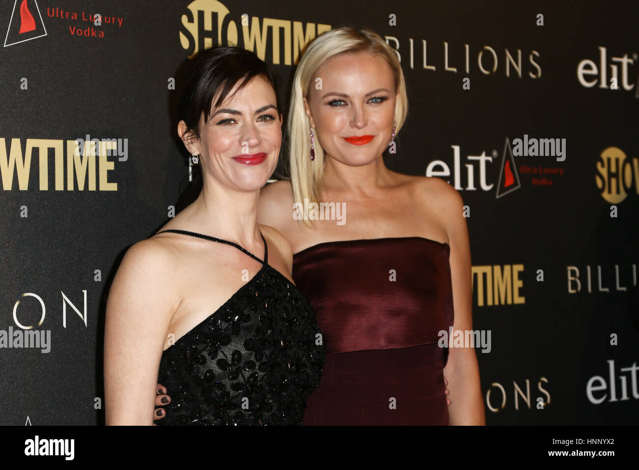 Actresses Maggie Siff (L) and Malin Akerman attend the 'Billions' Season Two Premiere at Cipriani's on February 13, 2017 in New York City. Stock Photo