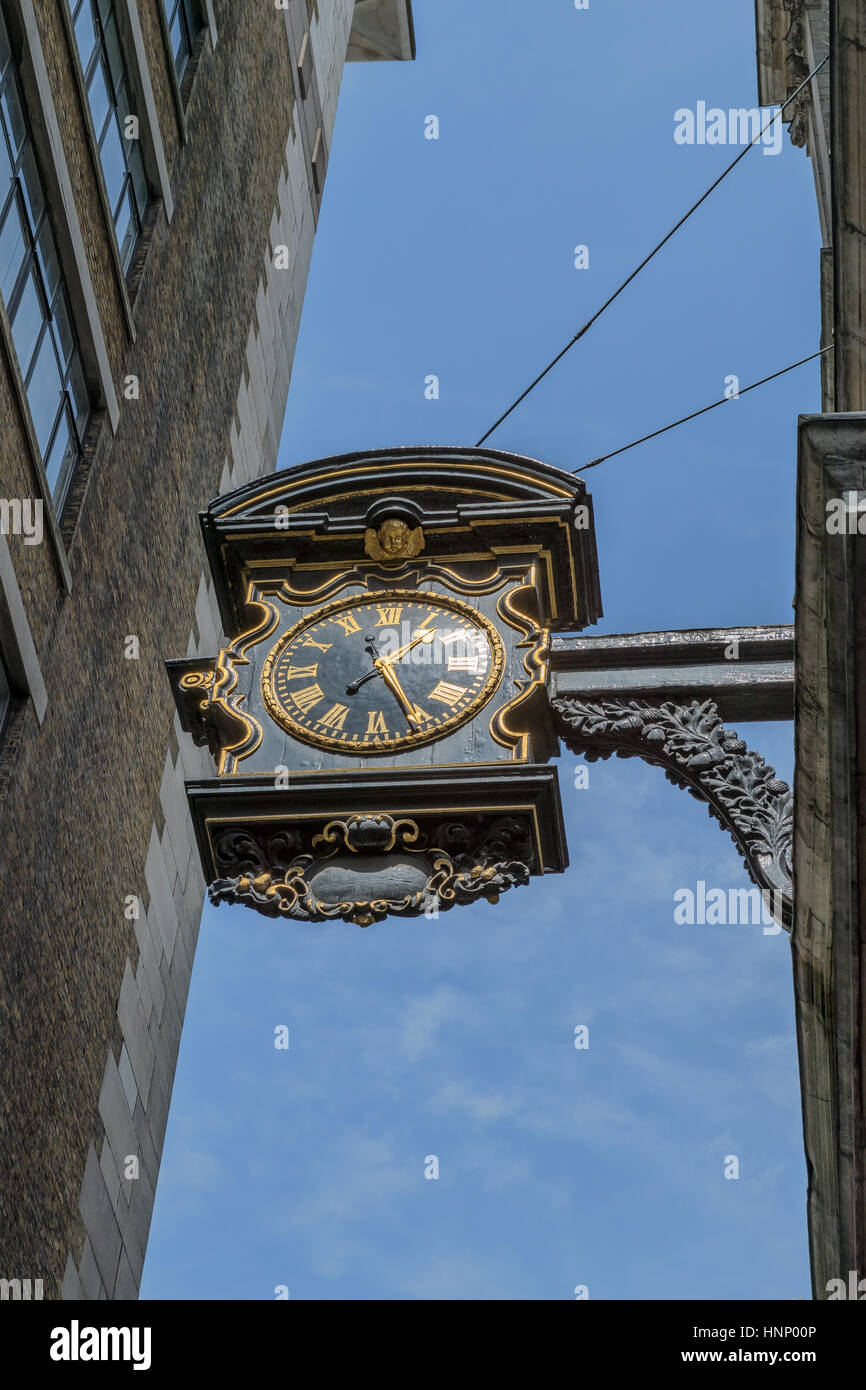 The clock outside St Magnus the Martyr in the City of London Stock Photo