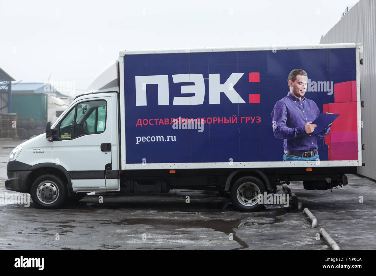 ST. PETERSBURG, RUSSIA - CIRCA JAN, 2016: Light truck of Russian transportation company PEC is on detrucking point. The PEC (First expedition company) Stock Photo