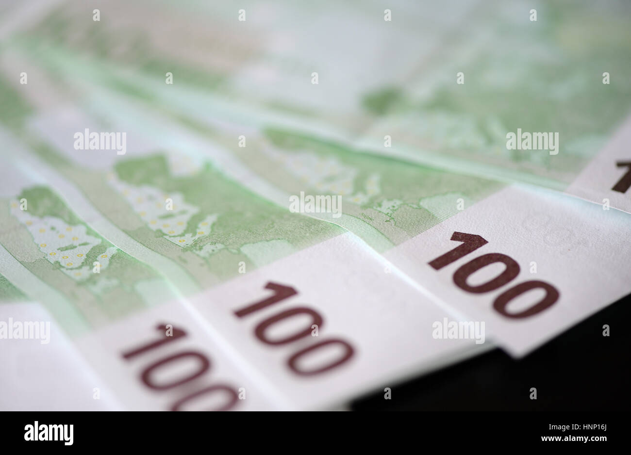 Banknotes in one hundred euros closeup Stock Photo