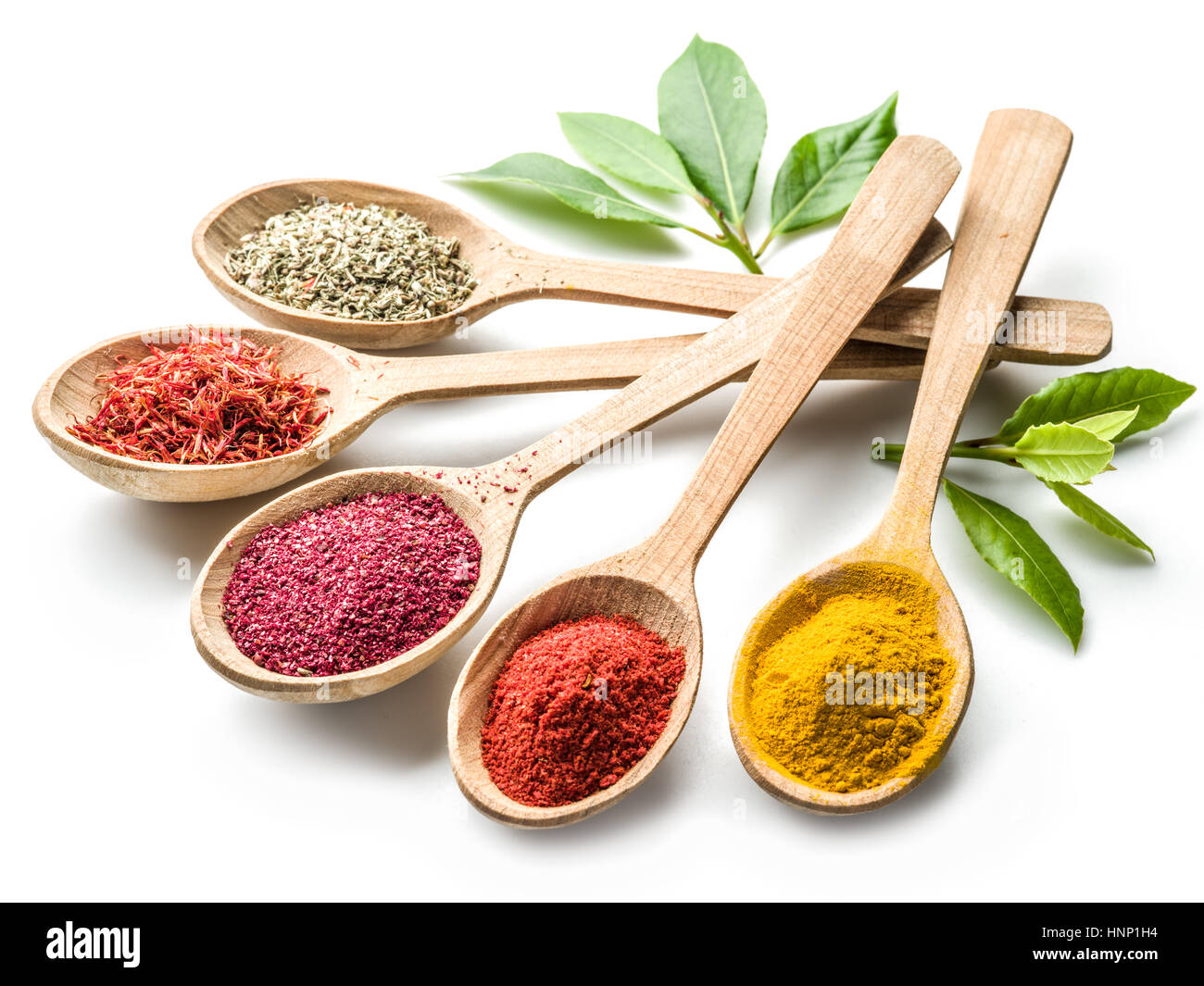 https://c8.alamy.com/comp/HNP1H4/assortment-of-colorful-spices-in-the-wooden-spoons-on-the-white-background-HNP1H4.jpg