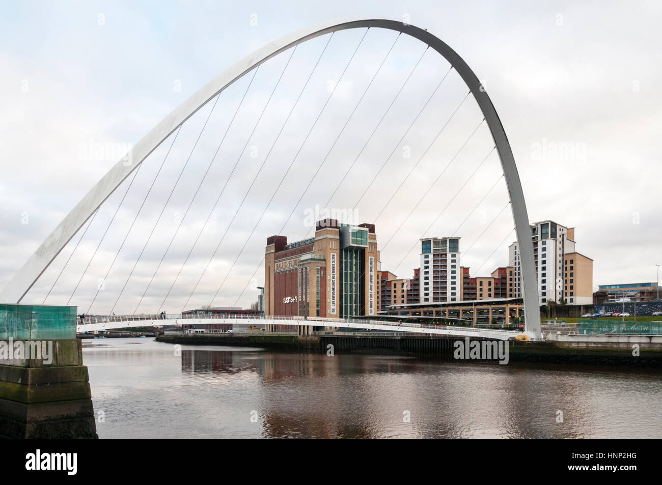 Gateshead Millennium Bridge over the River Tyne links Gateshead Quays and Baltic Centre on the south bank with Newcastle Quayside on the north bank.. Stock Photo