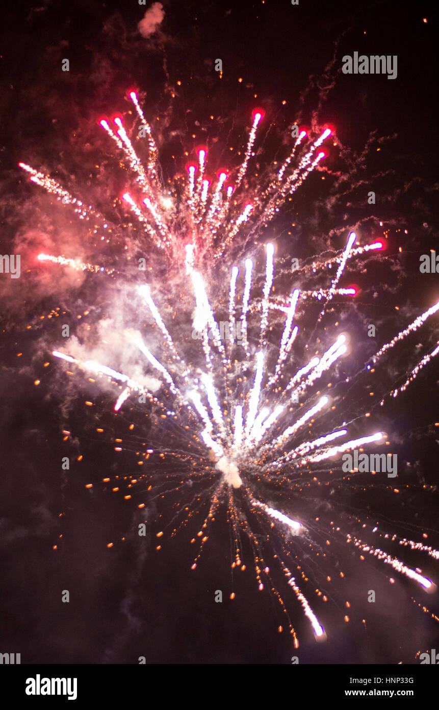 Bright firework explosions on the night sky Stock Photo Alamy