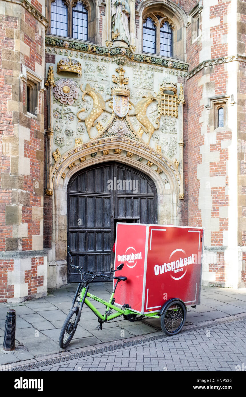 A large cargo delivery from the Outspoken local logistics company bike parked outside St John's College Cambridge. Stock Photo